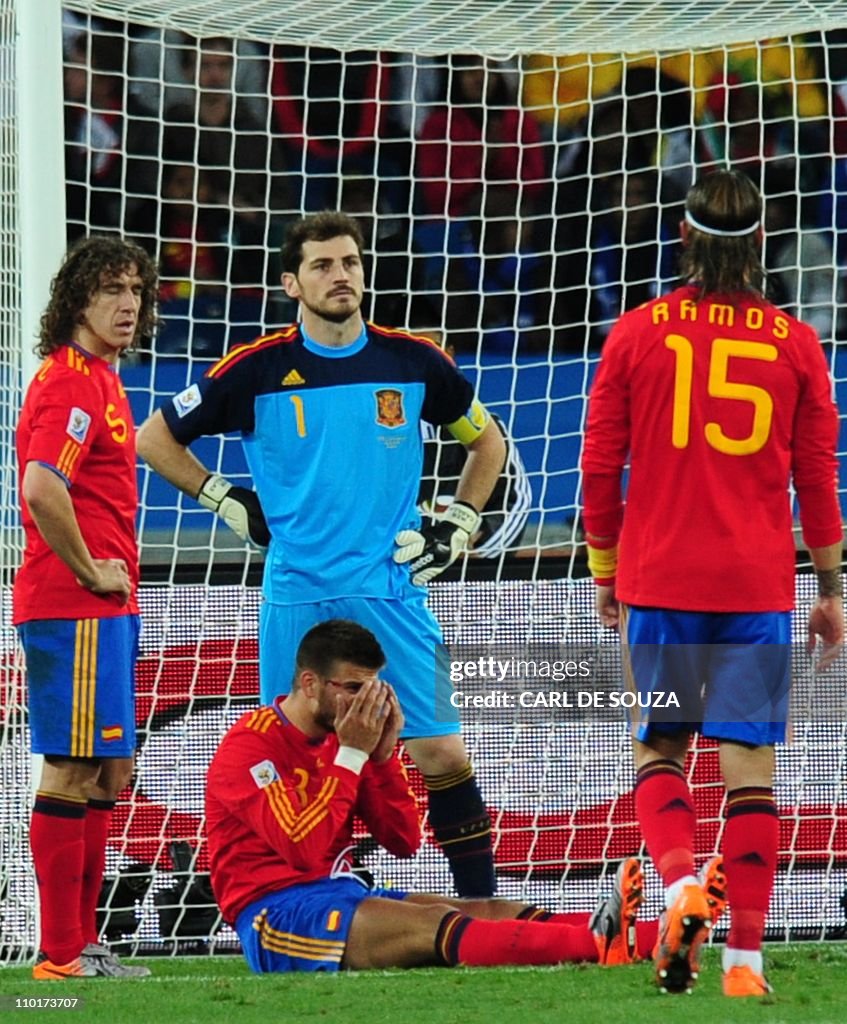 Spain's goalkeeper Iker Casillas (1) and