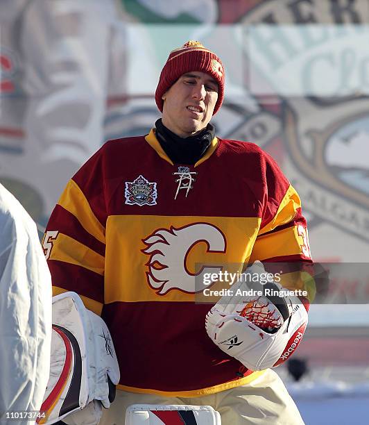 Henrik Karlsson of the Calgary Flames walks out for the practice before for the 2011 NHL Heritage Classic Game at McMahon Stadium on February 20,...