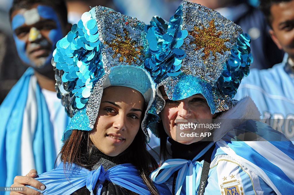 Argentina supporters pose during the 201