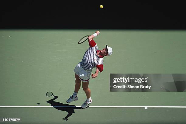 Jim Courier of the United States serves to Stefan Edberg during the Men's Singles final match on 31st January 1993 at the Australian Open in Flinders...