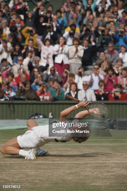 Stefan Edberg of Sweden falls to his knees in triumph to become champion after defeating Boris Becker during their Men's Singles final match at the...