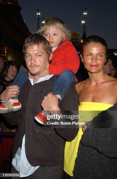 Norman Reedus, Helena Christensen and son Mingus during Cirque du Soleil's Latest Production "Varekai" Grand Opening at Randall's Island Park in New...