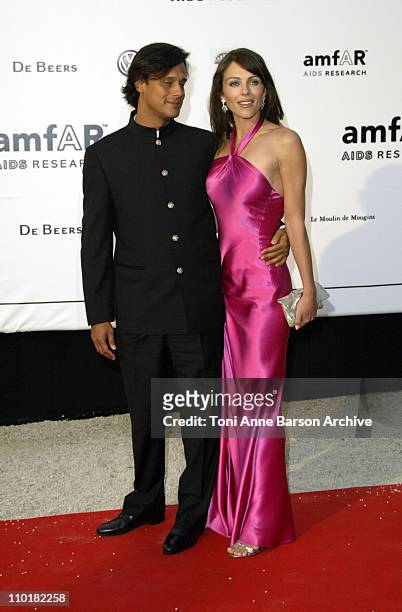 Arun Nayer and Elizabeth Hurley during 2003 Cannes Film Festival - Cinema Against Aids 2003 to benefit amfAR sponsored by Miramax - Arrivals at Le...