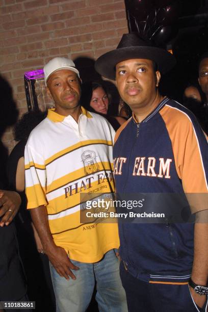 Russell Simmons with brother Rev Run of Run DMC arrive