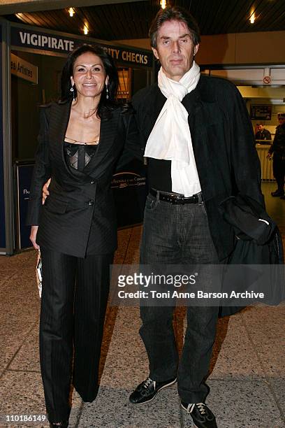 Mouna Ayoub and Dominique Dessaigne during 2004 NRJ Music Awards - Back Exit / After Show Departure at Palais des Festivals in Cannes, France.