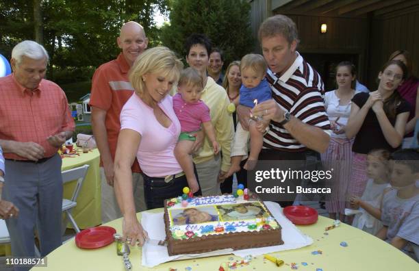 Joan Lunden and Jeff Konigsberg Hold the Twins Kate and Max Konigsberg with Pete Bolig and Deborah Bolig, the Twins Surrogate Mother, Looking on...