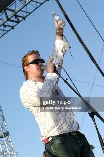 Josh Homme performs with Desert Sessions during 2004 Coachella Valley Music Festival - Day One at Empire Polo Fields in Indio, California, United...