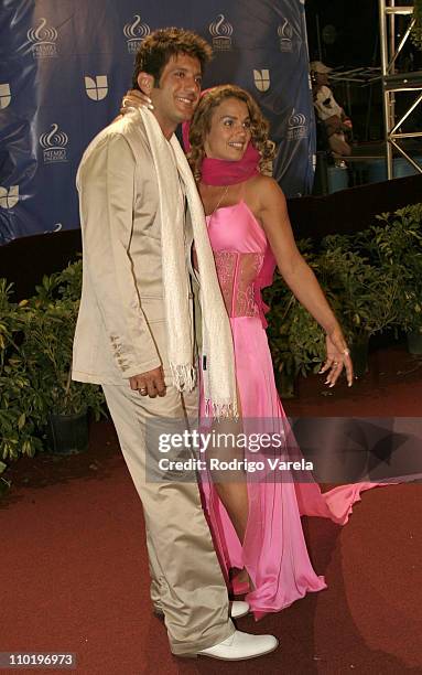 Bobby Larios and Niurka Marcos during 2004 Premio Lo Nuestro - Arrivals at Miami Arena in Miami, Florida, United States.