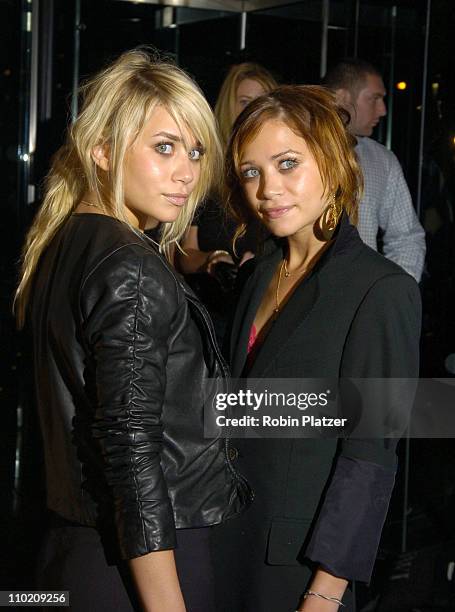 Ashley Olsen and Mary-Kate Olsen during The 100th Anniversary of Coty at American Museum of Natural Historys Rose Center for Earth in New York, New...