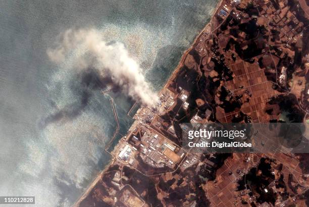 In this satellite view, the Fukushima Dai-ichi Nuclear Power plant after a massive earthquake and subsequent tsunami on March 14, 2011 in Futaba,...