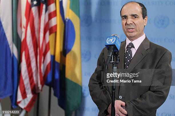 Ibrahim Dabbashi, Libya's deputy ambassador to the United Nations, speaks to the media outside a U.N. Security Council meeting on the situation in...