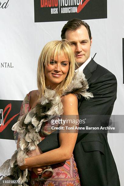 Sharon Stone and David Morrissey during 2005 Cannes Film Festival - "Basic Instinct 2: Risk Addiction" Photocall in Cannes, France.