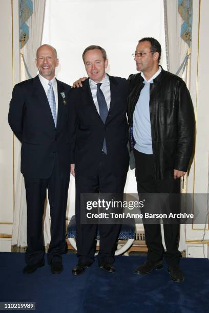 Bruce Willis, Renaud Donnedieu de Vabres, French Minister of Culture and Communication and Jean Reno