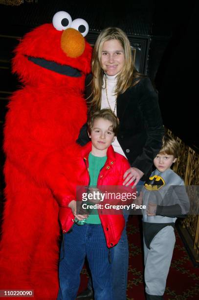Aerin Lauder with her sons Jack and Will pose with Elmo