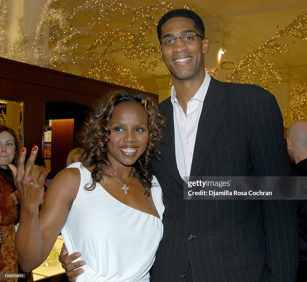 Cassandra Mills and Charles Smith during Lil'Kim attends Cassandra