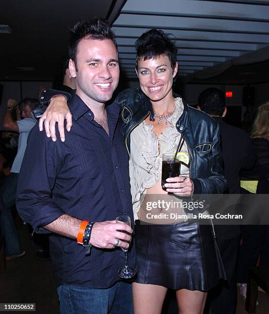 Chris Booker and Caron Bernstein during Cover Model Beth Ostrosky Celebrates her Birthday with Hamptons Magazine and Bulgari Aqua at Cain in...