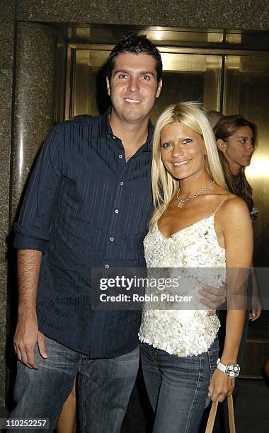 Lizzie Grubman and boyfriend Chris Stern during Olympus Fashion Week Spring 2006 - Baby Phat Fashion Show - Arrivals at Radio City Music Hall in New...