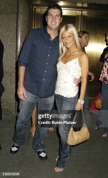 Lizzie Grubman and boyfriend Chris Stern during Olympus Fashion Week Spring 2006 - Baby Phat Fashion Show - Arrivals at Radio City Music Hall in New...