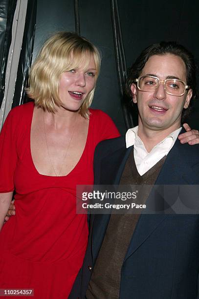 Kirsten Dunst and Marc Jacobs during Olympus Fashion Week Spring 2006 - Marc Jacobs - Front Row and Backstage at N.Y. State Armory in New York City,...