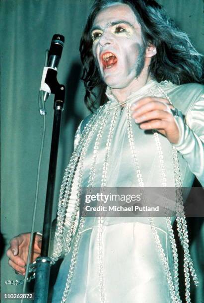 Peter Gabriel of Genesis performs on stage, London, 1971.