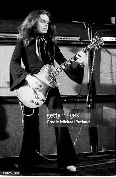 Paul Kossoff of Free performs on stage at Newcastle City Hall, 1972. He plays a Gibson Les Paul guitar through Marshall stack amplifiers.