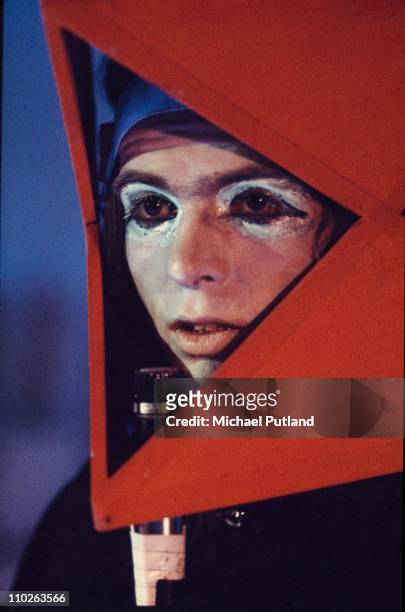 Peter Gabriel of Genesis performs on stage, London, 1973.