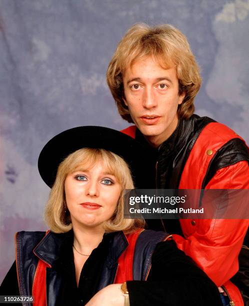 Robin Gibb of the Bee Gees with his wife Dwina, studio portrait, London, 1984.