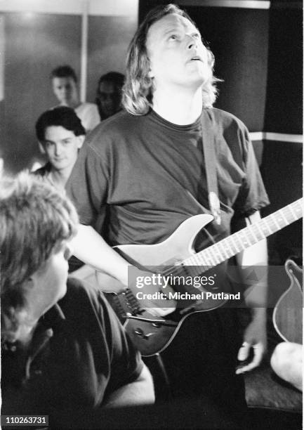 David Gilmour of Pink Floyd in recording studio during making of Armenia earthquake appeal record, London, 1989. He plays a Steinberger guitar.