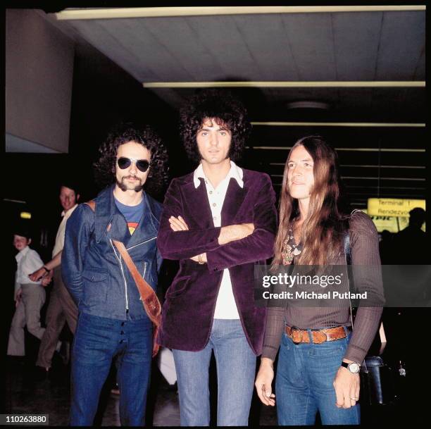 Grand Funk Railroad, L-R Donald Brewer, Mel Schacher and Mark Farner, group portrait at Heathrow Airport, London, 1971.