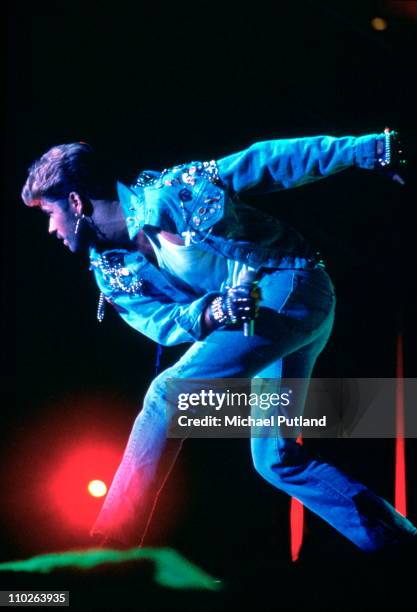 George Michael performs on stage circa 1988.