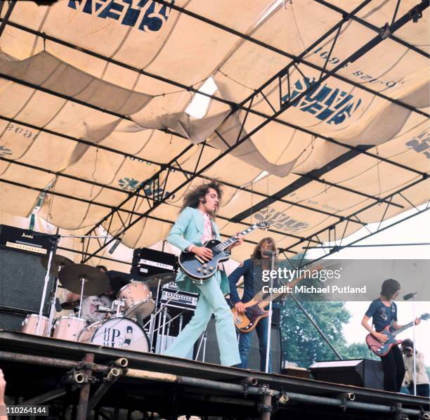 Humble Pie perform on stage at Hyde Park, London, 3rd July 1971, L-R Peter Frampton, Greg Ridley, Steve Marriott.