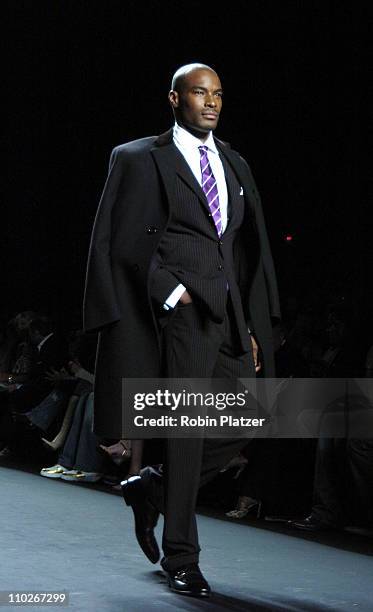 Tyson Beckford during Olympus Fashion Week Spring 2006 - Fashion For Relief - Runway at The Tents at Olympus Fashion Week in New York, New York,...