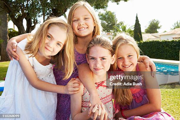 group of girls hugging - sister stock pictures, royalty-free photos & images