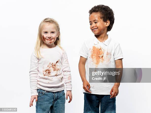 two kids covered in chocolate sauce - chocolate face stock pictures, royalty-free photos & images