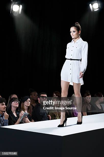 model on catwalk at fashion show - fashion show stock pictures, royalty-free photos & images
