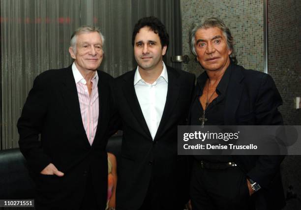 Hugh Hefner, George Maloof and Roberto Cavalli during The Premiere of the New Playboy Bunny Uniform Hosted by Hugh Hefner and Roberto Cavalli at The...