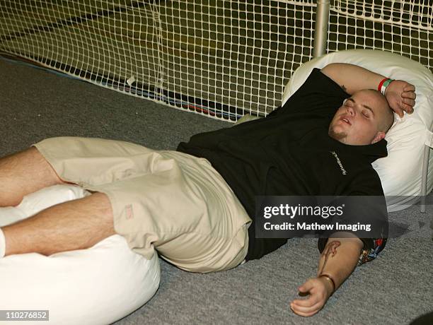 Guest sleeps while in line for the new Microsoft XBOX 360 gaming console.