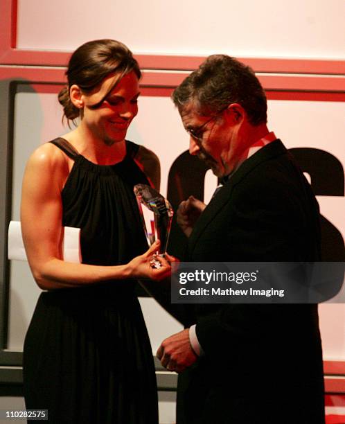 Hilary Swank presents the Motion Picture Showman of the Year award to Warner Bros. Barry Meyer *Exclusive*