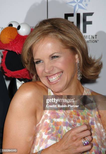 Elmo, Katie Couric during Katie Couric, EIF and NCCRA Present "Hollywood Meets Motown" Benefit - Arrivals at The Waldorf Astoria Hotel in New York,...