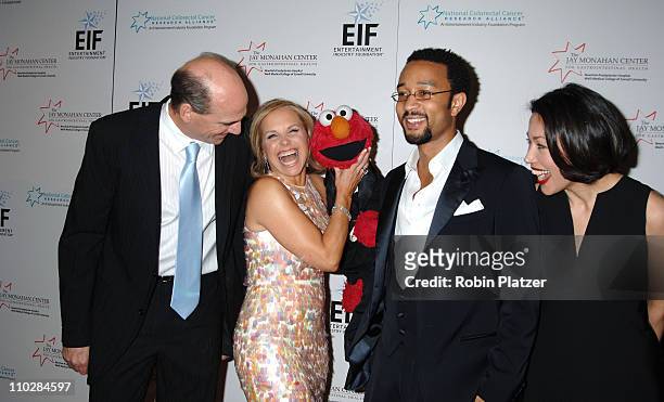 James Taylor, Katie Couric, Elmo and John Legend and Ann Curry