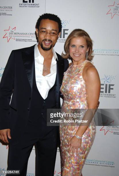 John Legend and Katie Couric during Katie Couric, EIF and NCCRA Present "Hollywood Meets Motown" Benefit - Arrivals at The Waldorf Astoria Hotel in...