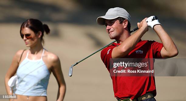 Susie Amy, ''Chardonny'' form the TV series Footballers Wives with boyfriend and golfer Steve Webster of England on the 3rd hole during his practice...