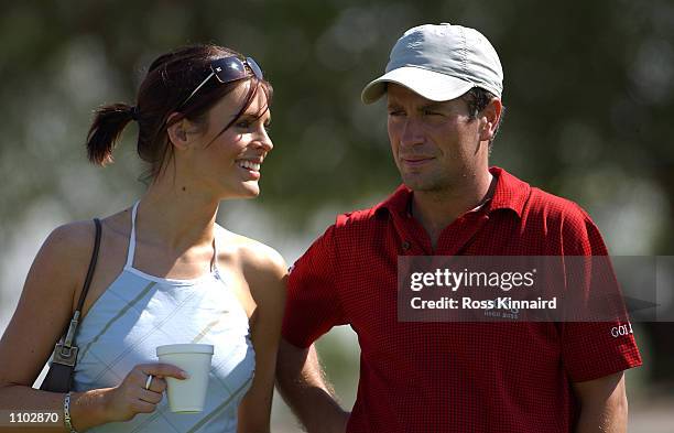 Susie Amy, ''Chardonny'' form the TV series Footballers Wives with boyfriend and golfer Steve Webster of England on the 3rd hole during his practice...