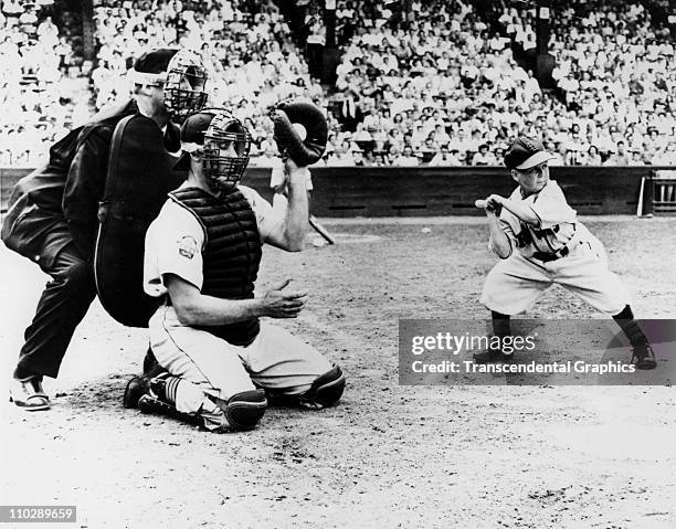 Eddie Gaedel, midget hired by St. Louis Browns owner Bill Veeck, takes a ball as he bats during a game on August 18, 1951 in St. Louis, Missouri.