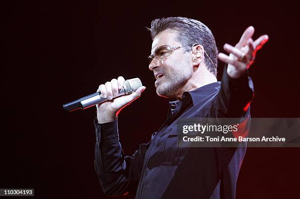 George Michael Instruments 253 George Michael In Concert In Paris Stock Photos, High-Res Pictures ...