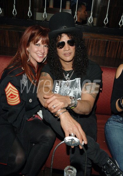 Guitarist Slash and his wife...