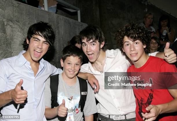 The Jonas Brothers posing with Jordan Mathew *EXCLUSIVE*