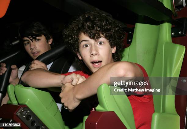 Nick Jonas on Tatsu during Miley Cyrus and The Jonas Brothers Visit Six Flags Magic Mountain at Six Flags Magic Mountain in Valencia, California,...