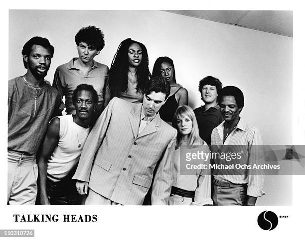 The Talking Heads line-up for the concert film 'Stop Making Sense' pose for a portrait in 1984.