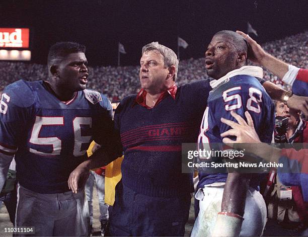 Jan 27, 1991 - Tampa, Florida, USA - Celebration - New York Giants head coach, BILL PARCELLS , LAWRENCE TAYLOR, CARL BANKS against Buffalo Bills in...